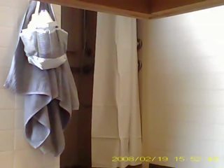 Spying charming 19 year old Ms showering in dorm bathroom